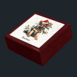 German Shepherd Puppy Christmas Holly Gift Box<br><div class="desc">The image on the lid of this cute Holiday gift box is of an adorable German Shepherd puppy wearing a red and white Santa Claus hat. Behind him is a sprig of holly and red berries. Tiny gold confetti on a white background gives a bit of glitter to the background....</div>