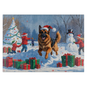 German Shepherd Running in Snow with Christmas Hat Cutting Board