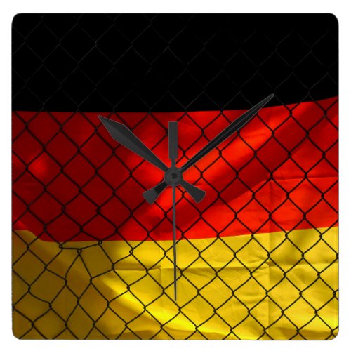 Germany Flag behind Chain Link Fence Square Wall Clock