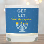 Get Lit Personalized Hanukkah Candle with Menorah<br><div class="desc">Light up your Hanukkah celebrations with this fun "Get Lit" candle! Featuring a vibrant menorah illustration, customizable family name text, and a playful message, this candle brings humor and warmth to any holiday setting. Perfect for creating a cozy atmosphere during the Festival of Lights, it’s ideal for lighting up family...</div>