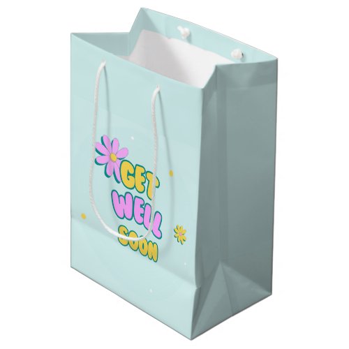 Get well soon bold text with flowers on blue medium gift bag