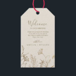 Gilded Floral Cream and Gold Wedding Welcome Gift Tags<br><div class="desc">These gilded floral cream and gold wedding welcome gift tags are perfect for an elegant wedding. The modern boho design features a whimsical arrangement of faux gold foil hand drawn flowers, leaves and botanicals on a cream background. Personalize the tags with the location of your wedding, a short welcome note,...</div>
