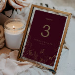 Gilded Floral Printable Burgundy Gold Table Number<br><div class="desc">This gilded floral printable burgundy and gold table number is perfect for an elegant wedding. The modern boho design features a whimsical arrangement of faux gold foil hand drawn flowers, leaves and botanicals on a burgundy background. The card prints on the front and back (double-sided). Add each table number that...</div>