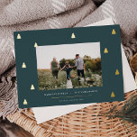 Gilded Forest | Elegant Christmas Photo Foil Holiday Card<br><div class="desc">A modern and elegant Christmas holiday card design featuring a horizontal photo on a deep spruce green background dotted with gold foil pine trees. Personalize with your custom holiday greeting,  family name and the year beneath.</div>