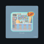 Gilmore Girls | Luke's Diner Graphic Metal Print<br><div class="desc">Step inside the heart of Stars Hollow with this charming illustration of Luke's Diner. From the classic counter stools to the colorful chalkboard menu,  this design captures every detail of the beloved local hangout.</div>