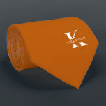 Ginger Orange Elegant Monogram   Name | Two-Sided Neck Tie<br><div class="desc">An elegant necktie featuring a bold white monogram across a Ginger color background. On top of this monogram sits your first or last name spelled out in all capitals. If you prefer a bolder look for the personal name inside of the large letter you can do the following: Use the...</div>