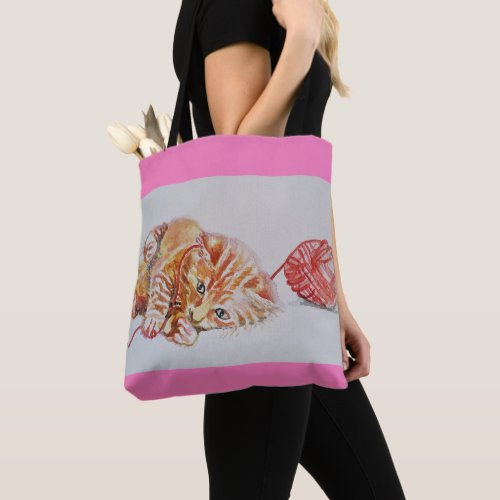 Ginger Tabby Cat Play Pink cats Grocery Tote Bag