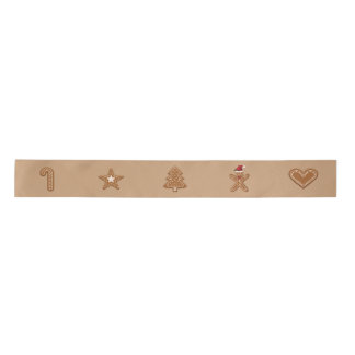 Gingerbread Christmas Cookie Shapes On Brown Satin Ribbon