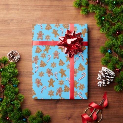 gingerbread cookies and candy canes on aqua wrapping paper