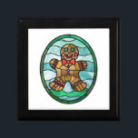 Gingerbread man stained glass gift box<br><div class="desc">Share the joy of Christmas with this charming design that will remind you of cozy gatherings,  yummy treats,  and the spirit of giving. Get yours today and make you and your space merrier this holidays season. Gingerbread man stained glass style,  classic and colourful. Illustration made by Mosaiclisa.</div>