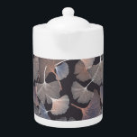 Ginkgo leaves: elegant natural pattern. teapot<br><div class="desc">Ginhko leave pattern
Traditional gingko leaves pattern for a touch of elegance.
Gingko leaves create an elegant and timeless pattern.
background, ginkgo, pattern, abstract, texture, decor, flowers, nature, vintage, tree, illustration, spring, leaf, white, floral, autumn, health, green, line, black</div>