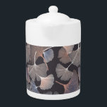 Ginkgo leaves: elegant natural pattern. teapot<br><div class="desc">Ginhko leave pattern
Traditional gingko leaves pattern for a touch of elegance.
Gingko leaves create an elegant and timeless pattern.
background, ginkgo, pattern, abstract, texture, decor, flowers, nature, vintage, tree, illustration, spring, leaf, white, floral, autumn, health, green, line, black</div>