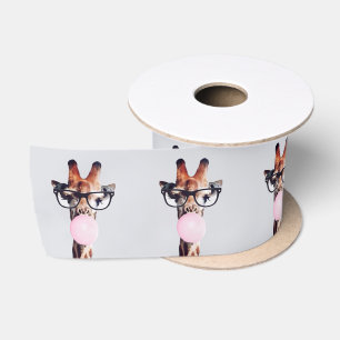 Giraffe wearing glasses blowing a pink bubble gum satin ribbon
