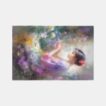Girl admiring a flower in her hands