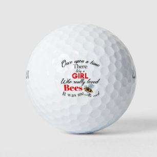 girl bees golf balls
