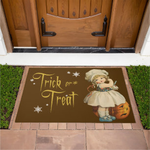 Girl Carving Apple Halloween Doormat
