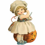 Girl Carving Apple Halloween Ornament<br><div class="desc">Vintage Ellen Clapsaddle Halloween postcard from showing an adorable little girl carving an apple and tossing the shards over her shoulder with pumpkin behind her. Reprinted  as a two-sided photo sculpture which can be an ornament,  a magnet,  a pin,  or keychain.</div>