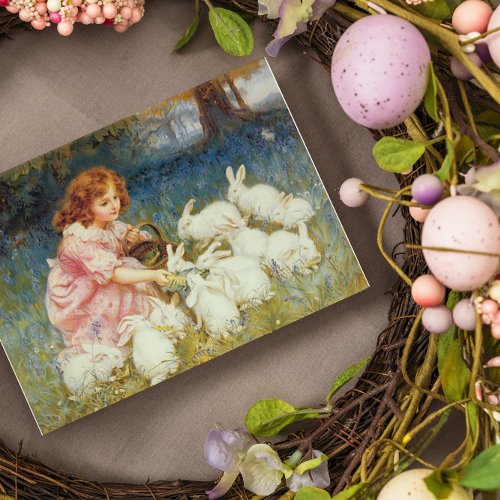 Girl feeding rabbits rectangular sticker