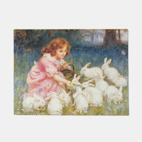 Girl Feeding the Rabbits by Frederick Morgan Doormat
