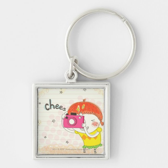Girl holding camera, clicking keychain (Front)