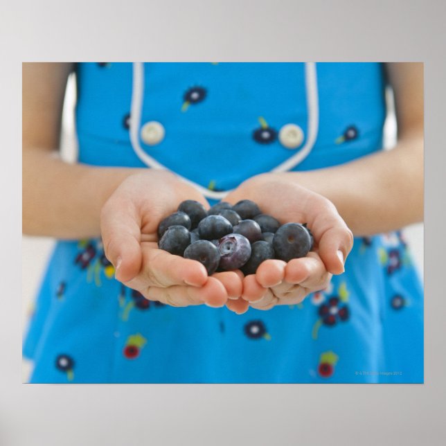 Girl holding fresh blueberries poster (Front)