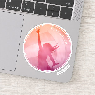 girl playing beach volleyball at sunset sticker