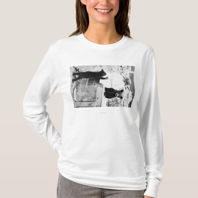 Girl Playing with Bear Cub in Seward T-Shirt (Front)