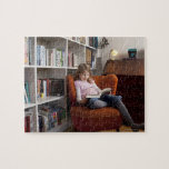 Girl reading by the bookshelf jigsaw puzzle