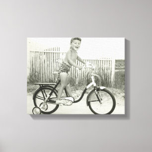 Girl Riding Bicycle Canvas Print