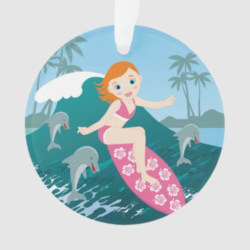 Girl surfs big wave with dolphins ornament