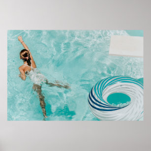 Girl wearing swimsuit and swims in pool poster