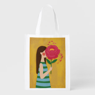 girl with flowers grocery bag