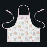 Girls Cute Pink Watercolor Boho Rainbow Pattern Apron<br><div class="desc">This cute and whimsical kids apron design features a boho watercolor rainbow and nature pattern with flowers and leaves,  and can be personalized with your girls name. The perfect gift for a little chef!</div>