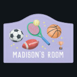 Girls Cute Purple Tennis and Soccer Sports Kids Door Sign<br><div class="desc">This cute sports-themed girls room door sign design features a basketball,  football,  tennis racket,  soccer ball,  and trophy,  and can be personalized with your girls name. Perfect for sports-loving children. Great purple decor for a kid's room or a baby's nursery!</div>