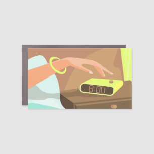 Girls hand pushing on alarm clock snooze button car magnet