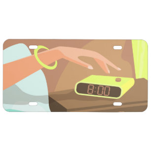 Girls hand pushing on alarm clock snooze button license plate