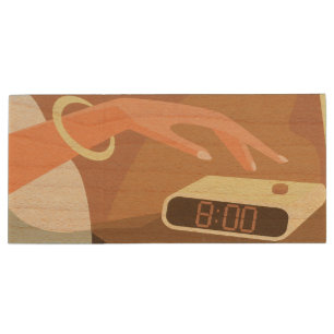 Girls hand pushing on alarm clock snooze button wood flash drive