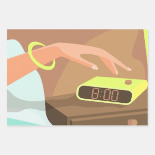 Girls hand pushing on alarm clock snooze button wrapping paper sheets