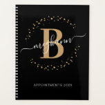 Girly Modern Black Gold Name Script Monogram 2024  Planner<br><div class="desc">Girly, modern, trendy, elegant, black and gold monogram initial name script custom personalized monogrammed beauty salon 2024 or any year planner. Featuring a monogram initial and a girly name script in a hand lettered calligraphy swash tail font and dotted circle frame around your monogram. Great feminine girly gift for birthday,...</div>