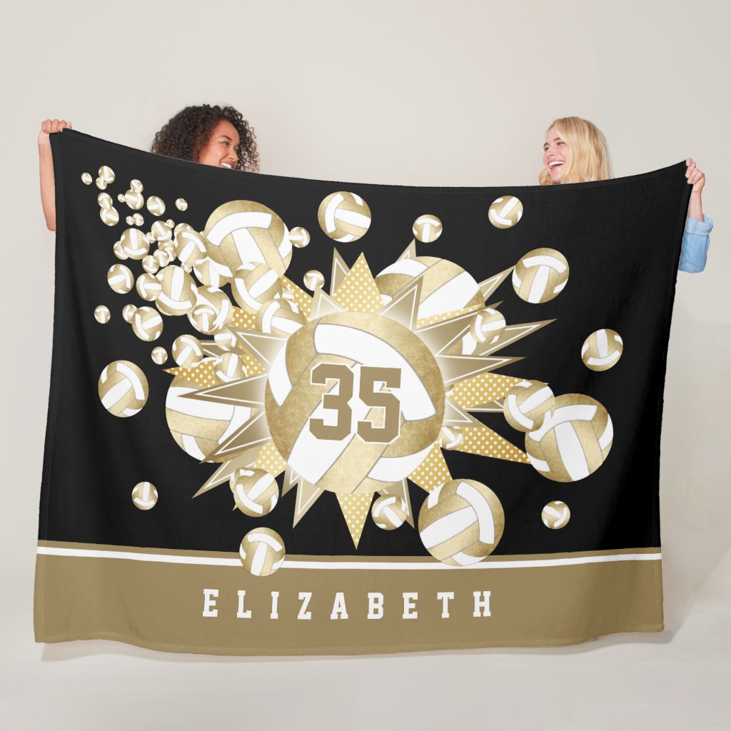muted gold volleyballs and stars fleece blanket