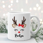 Girly Reindeer Face Personalized Name Christmas Coffee Mug<br><div class="desc">Cute Christmas coffee or hot cocoa mug features an illustration of a sweet reindeer girl face with pretty eyelashes, rosy blush cheeks, a red bow on her antlers, and a shiny red nose. Personalize this festive hot chocolate mug with a first name or other custom text. Makes a fun holiday...</div>