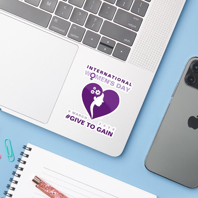 Give To Gain International Women's Day 2026 Sticker (Laptop w/ iPhone)