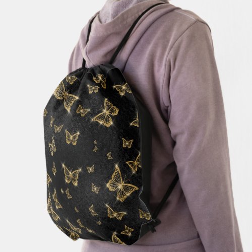 Glam gold and black butterflies pattern drawstring bag