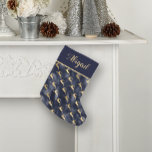 Glam Navy Blue Gold Reindeer Pattern Personalized Small Christmas Stocking<br><div class="desc">With its pattern of gold reindeer silhouettes leaping on a navy blue faux foil background, this Christmas stocking will make an elegant addition to your holiday decor. Personalize it with a name or other text in gold-colored calligraphy on a solid navy blue color block with a gold-colored edge. The design...</div>