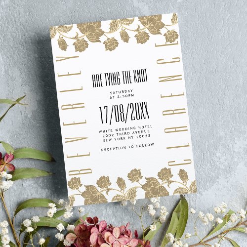 Glam white gold glitter floral typography wedding invitation