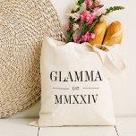 Glamma Roman Numeral Year Established Tote Bag<br><div class="desc">A modern minimalist tote bag to celebrate a chic grandma,  this clean minimal tote features "Glamma" or your choice of grandma nickname in black serif lettering. Customize with the year she became a grandmother beneath in elegant roman numerals for a chic touch.</div>