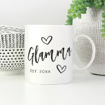Glamma Year Established Grandma Coffee Mug<br><div class="desc">Create a sweet keepsake for grandma with this simple design that features "Glamma" in hand sketched script lettering accented with hearts. Personalize with the year she became a grandmother for a cute Mother's Day or pregnancy announcement gift.</div>