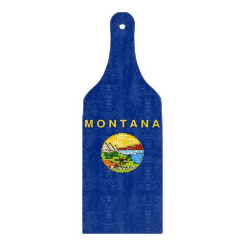 Glass cutting board paddle with Montana flag