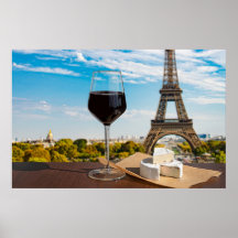 Glass of wine with brie cheese on Eiffel tower