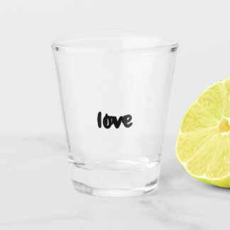 glass with the word love written on it